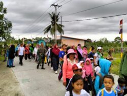 Bersinergi dengan Masyarakat, Satgas Pamtas Yonif 132/BS Ikut Memperingati HUT Kampung Sanggaria