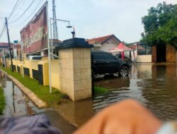 Diduga Asal Tambal Saat Memperbaiki Jalan, Polsek Pasar Kemis Terendam Banjir