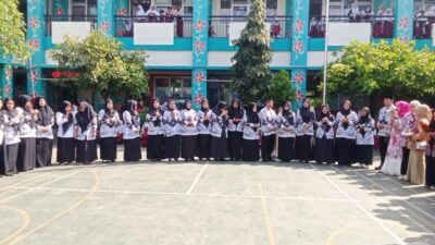 SDN Pondok Kacang Timur 02 Gelar Giat Potong Tumpeng Dalam Acara Hari Guru Nasional Ke-79