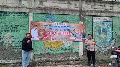 Cegah Tawuran Sejak Dini, Bhabinkamtibmas Ciater Pasang Spanduk STOP Tawuran